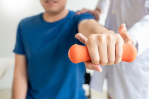 Physiotherapist working concept, Doctor and patient suffering or